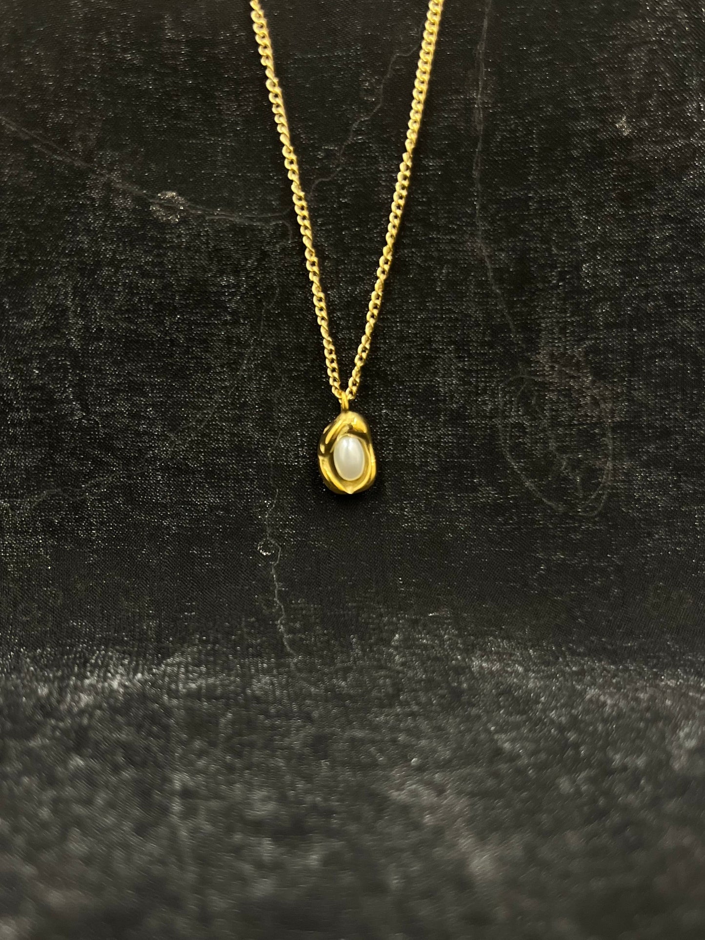 Elegant Gold Chain with Pearl Nest Pendant
