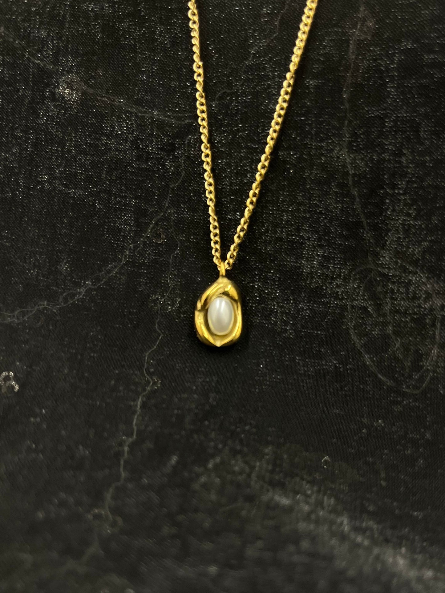 Elegant Gold Chain with Pearl Nest Pendant