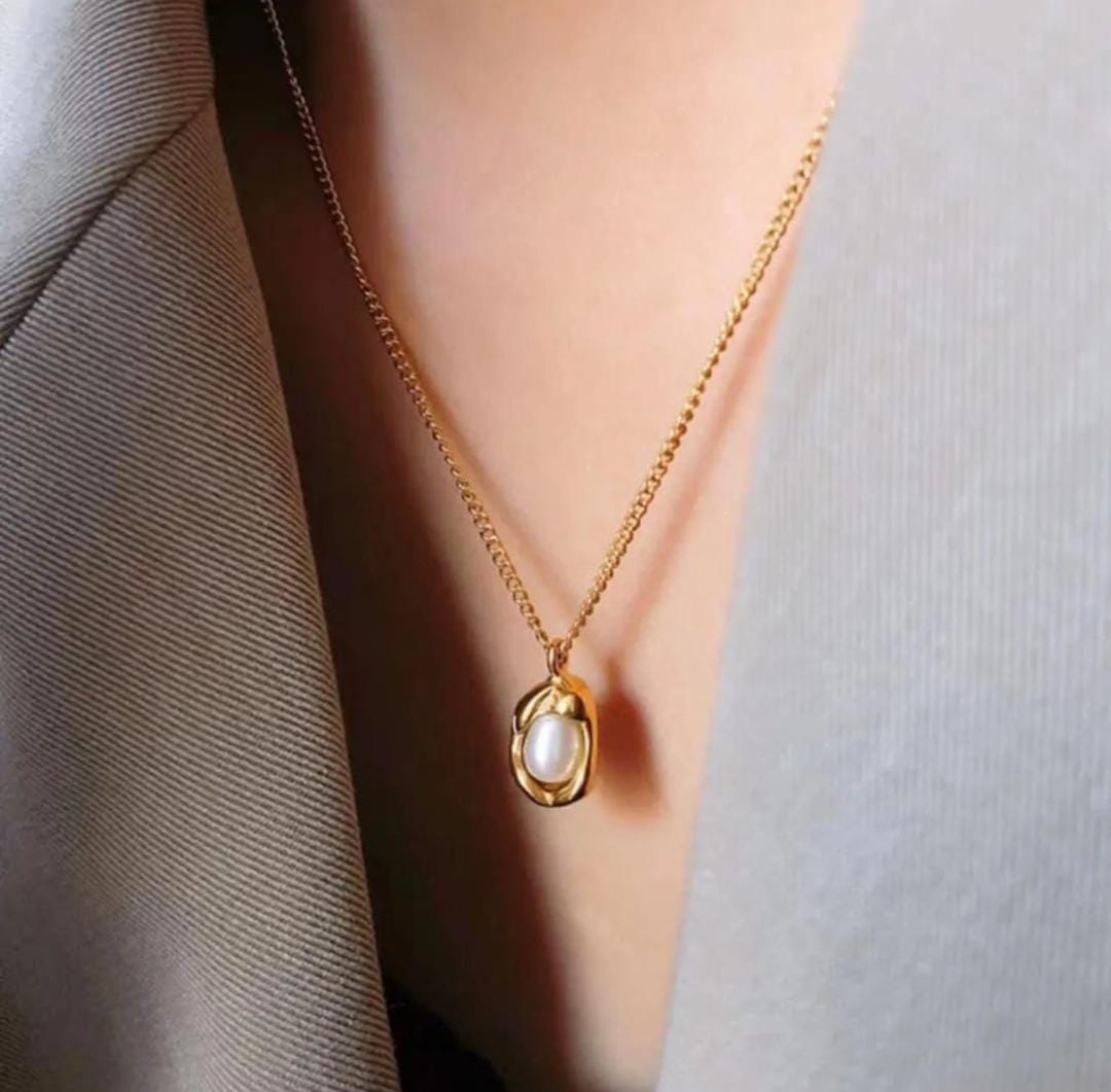 Elegant Gold Chain with Pearl Nest Pendant