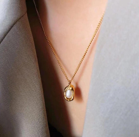 Elegant Gold Chain with Pearl Nest Pendant